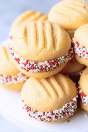 Melting moments dipped in Christmas Sprinkles.