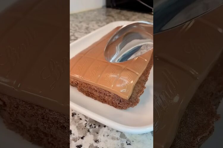 Chocolate cake with a whole block of chocolate on top 🔝