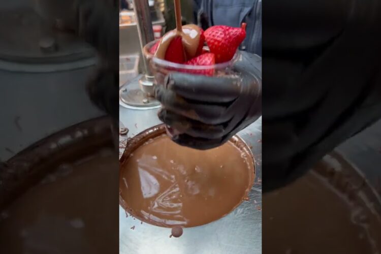 Trying the Chocolate Covered Strawberries at London's Borough Market  #food #foodie #travel